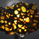 Image for article titled 30 Starry Wonders Hiding Inside of Dull Meteorites